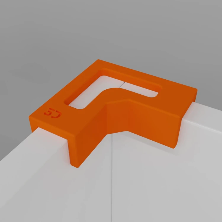 Pomarańczowy narożny uchwyt kątowy typu L 3dek zamontowany na dwóch formatkach 18mm